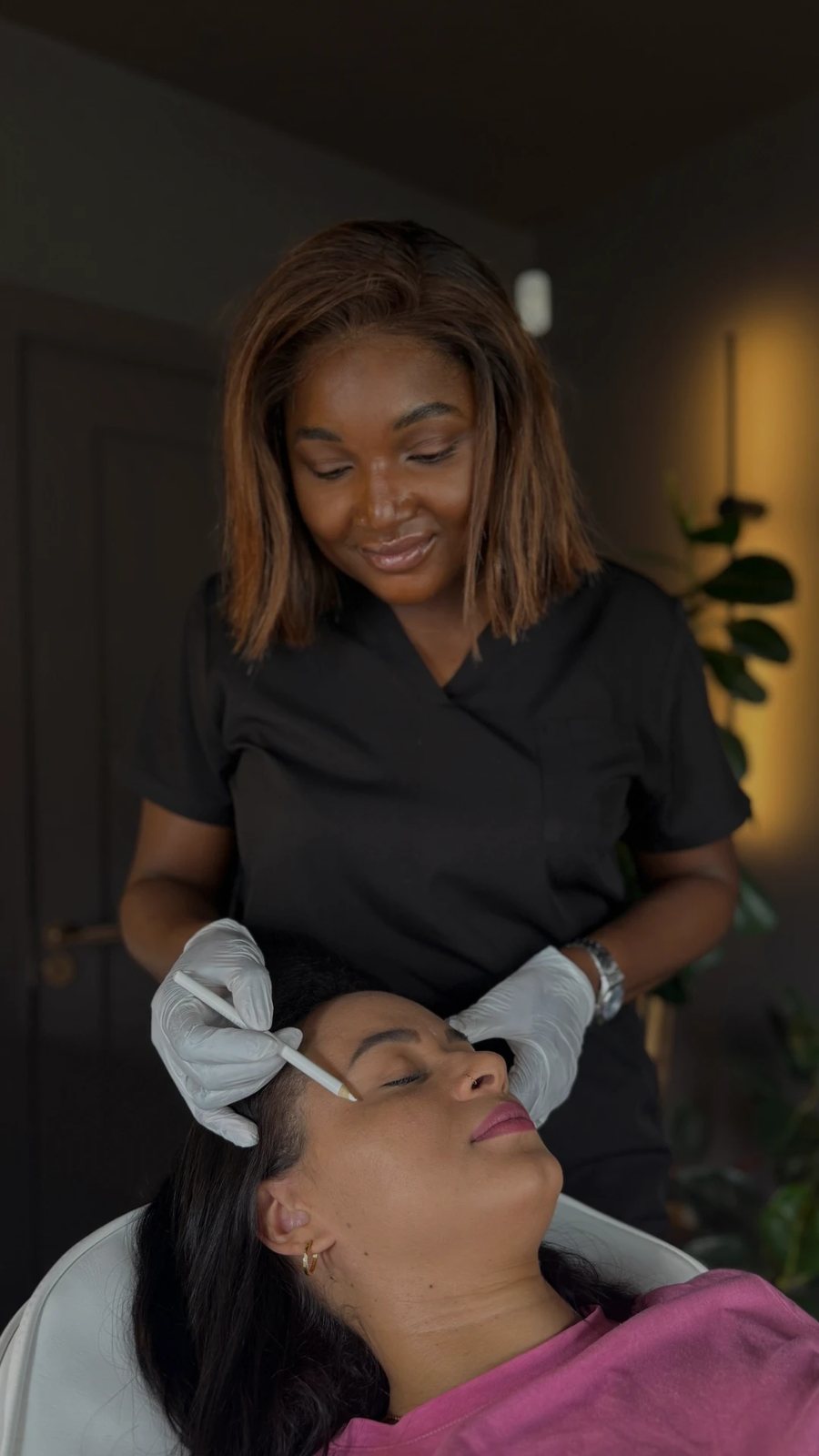 Dr Tafadzwa mapping a treatment plan with a patient at Lumina Aesthetics, Limerick