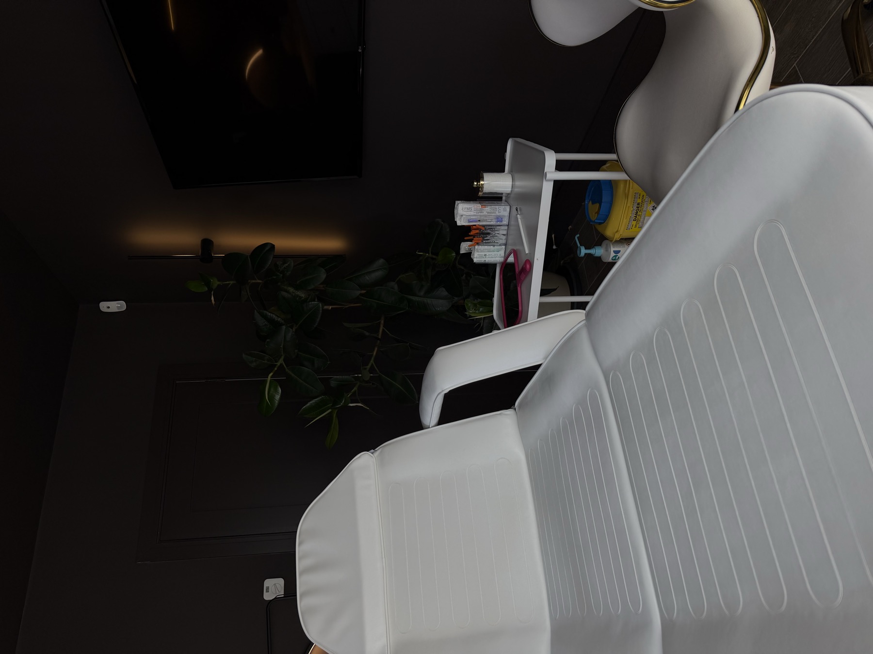 Treatment chair and warm lighting at Lumina Aesthetics, Limerick