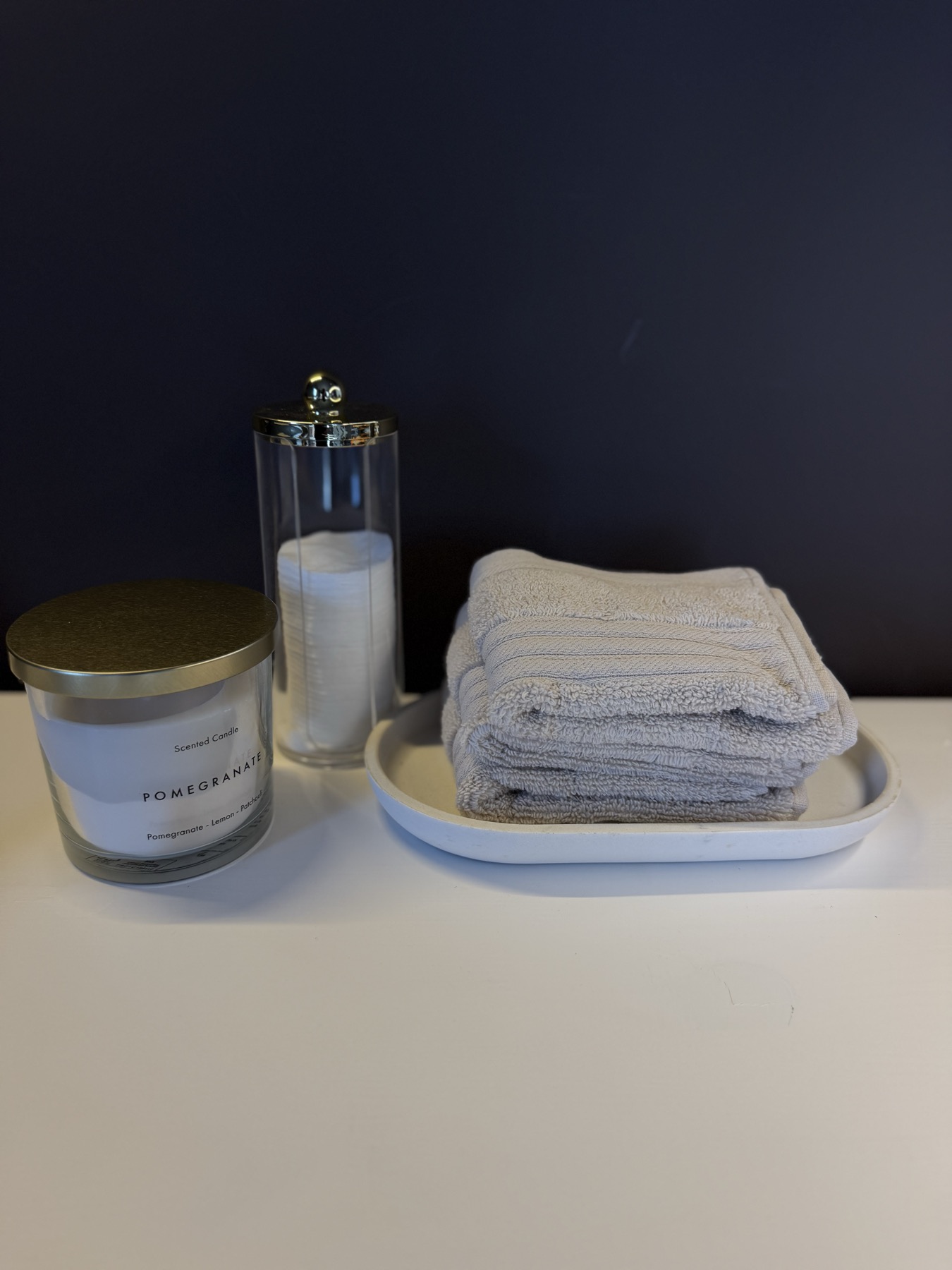 Candle and towels detail at Lumina Aesthetics, Limerick