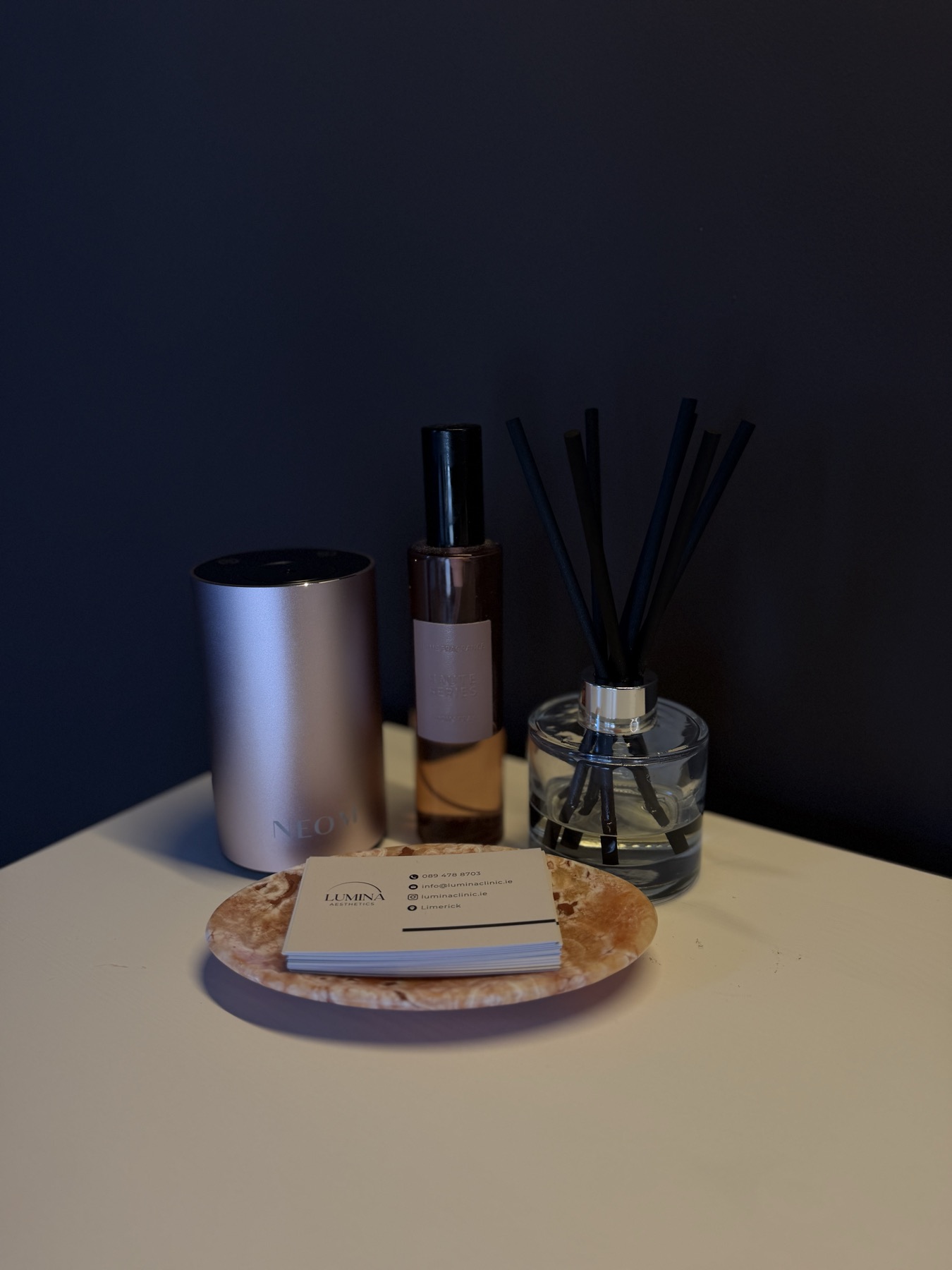 Lumina Aesthetics brand details and consultation cards
